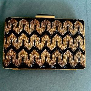 This is a  evening bag beautiful beaded black & gold